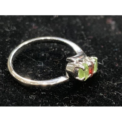 Silver ring with precious stone